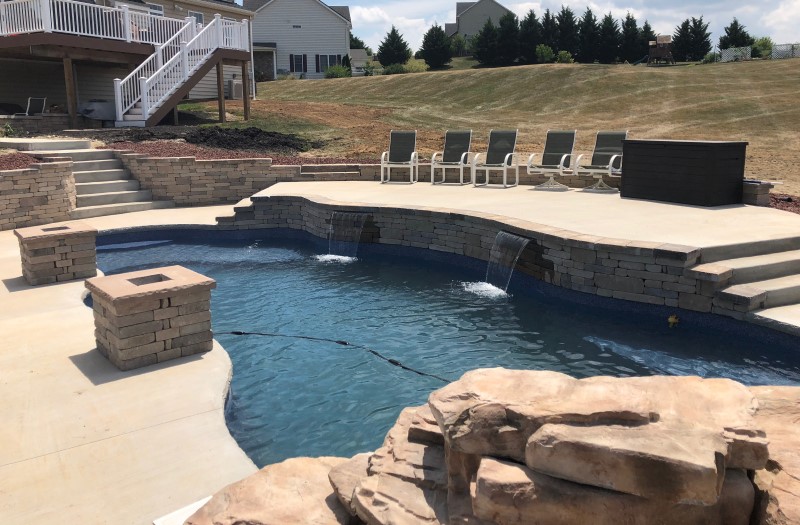 photo of a pool-side retaining wall