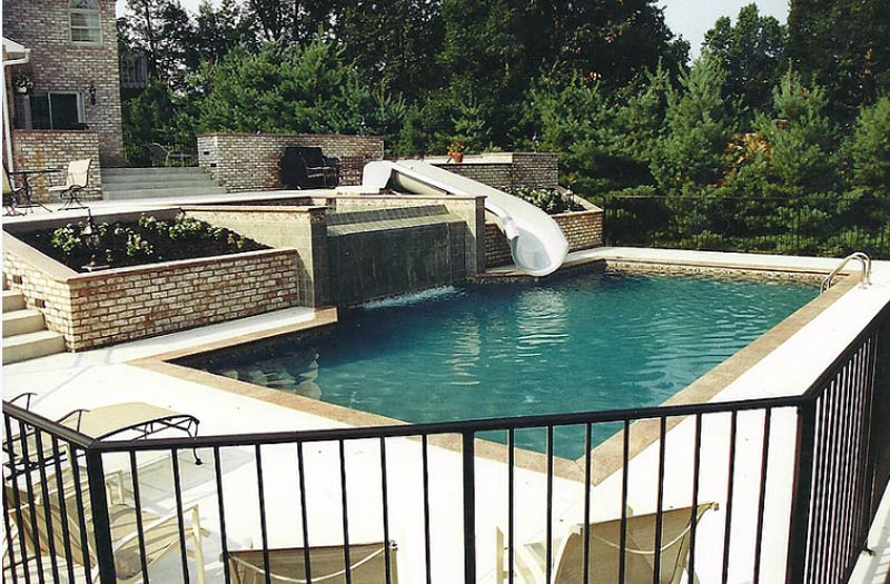 photo of a pool-side retaining wall