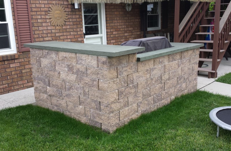 photo of a pool-side retaining wall